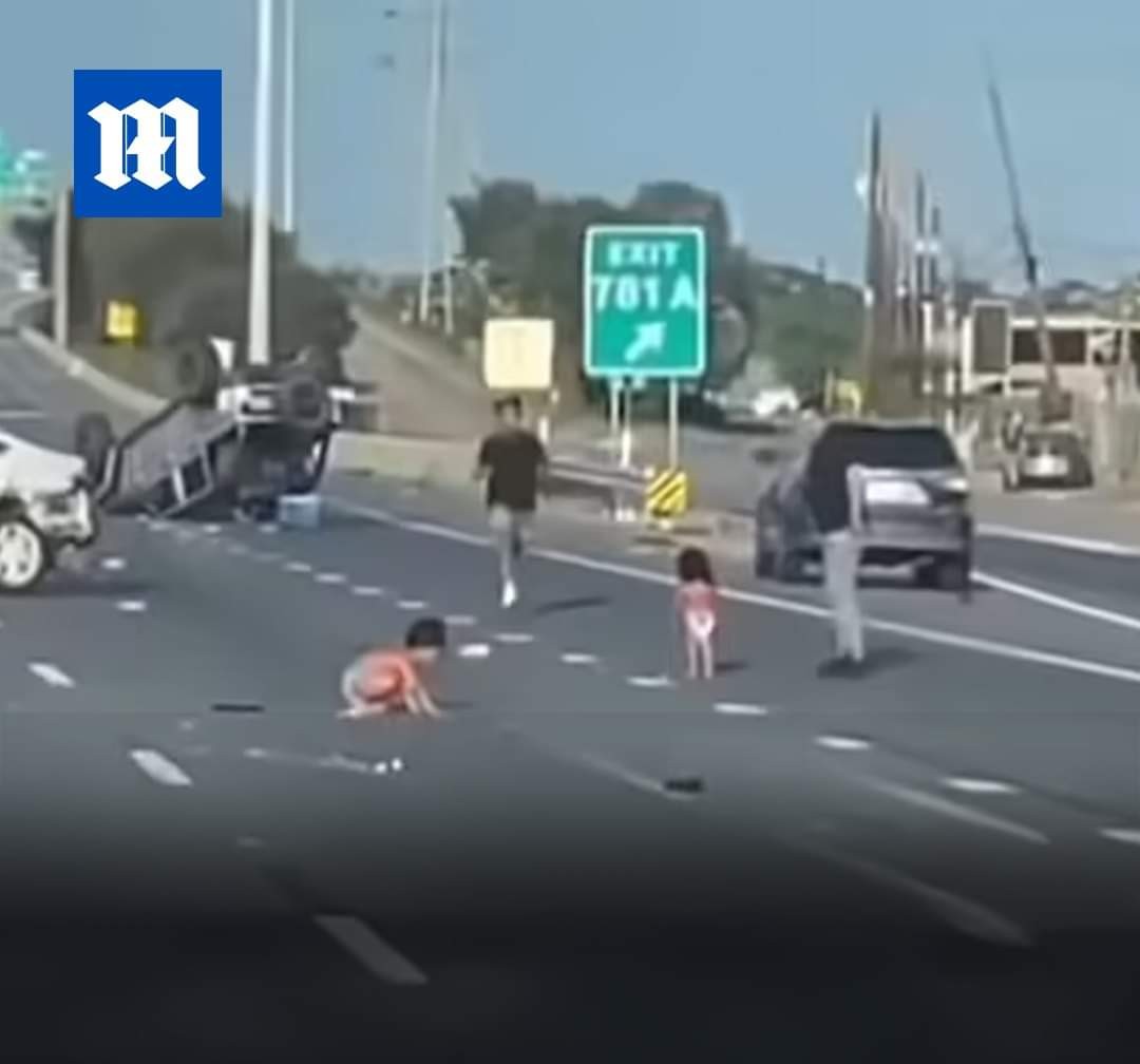 Toddlers seen in highway after being thrown from car in crash