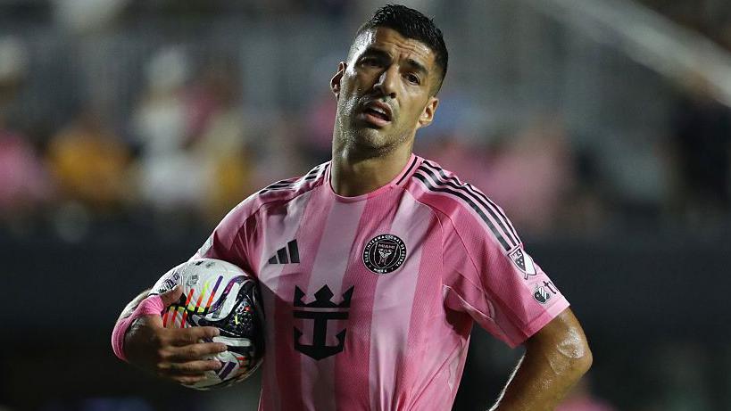 Luis Suarez faces long-term suspension after spitting at opponent’s coach