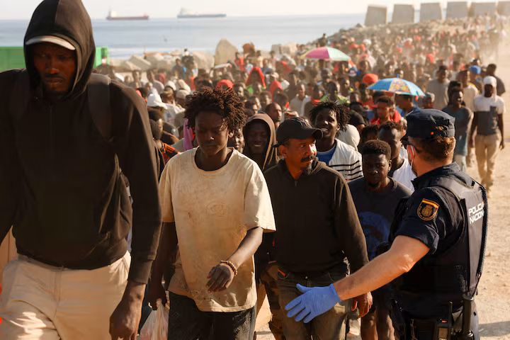 Spain asks EU for help processing migrants in Ceuta